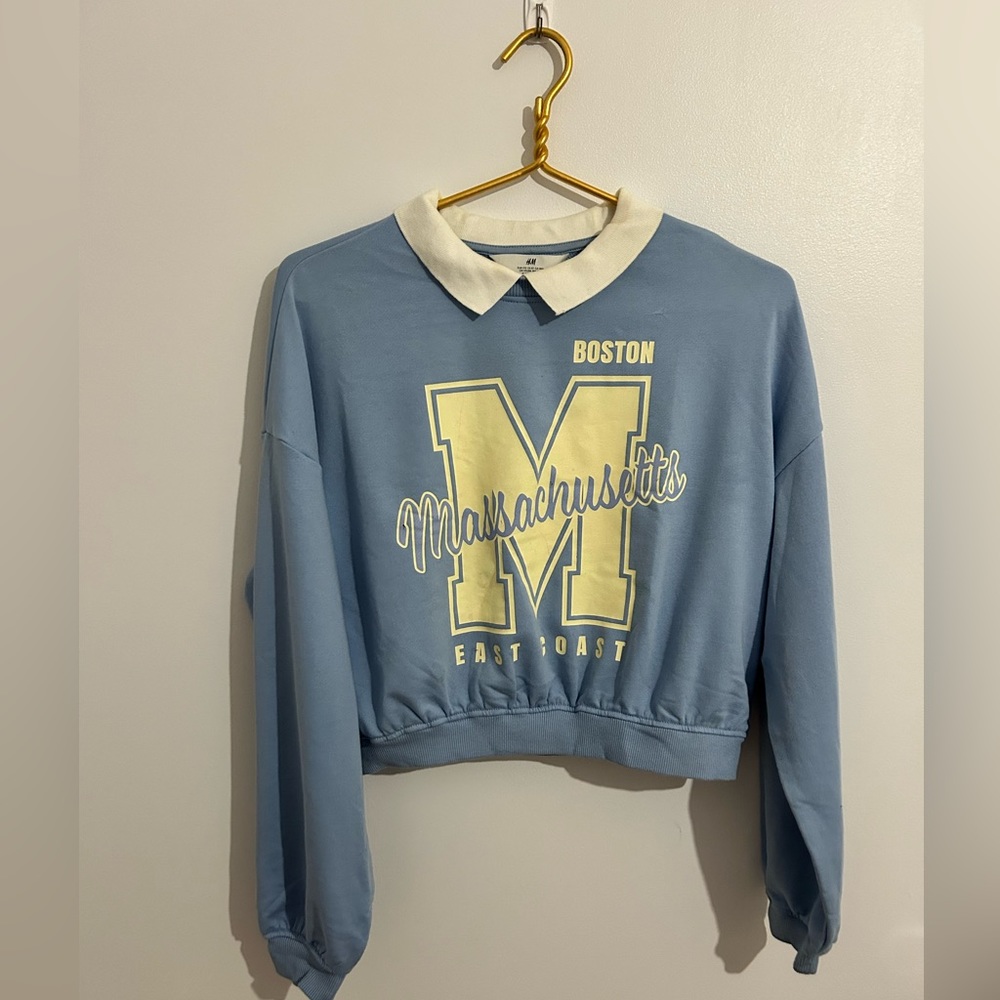 Super cute and trendy sweater with collar